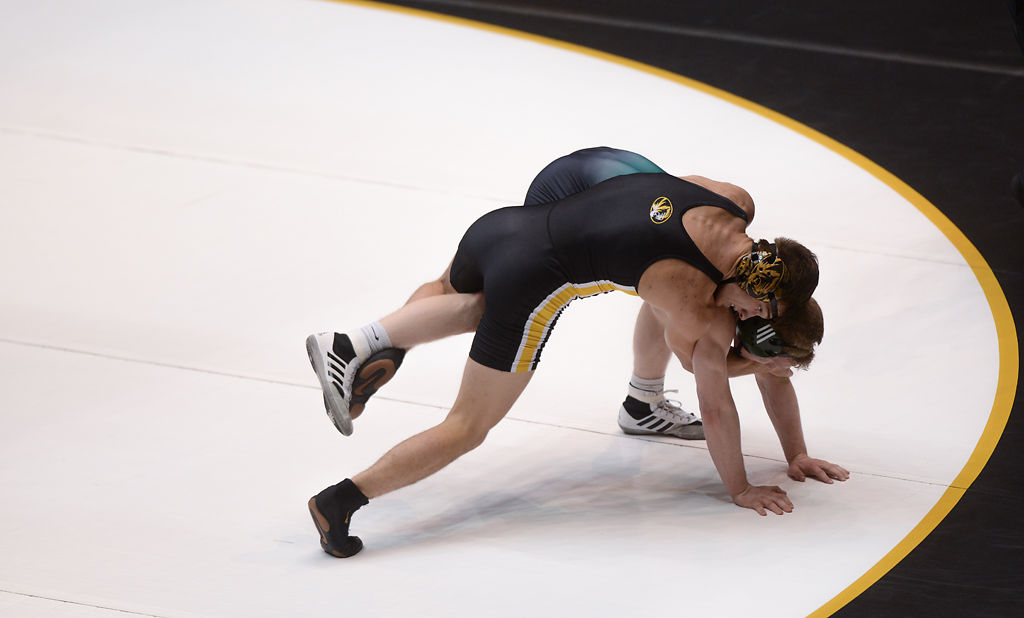 Brock Mauller attempts to pin Alec Hagan